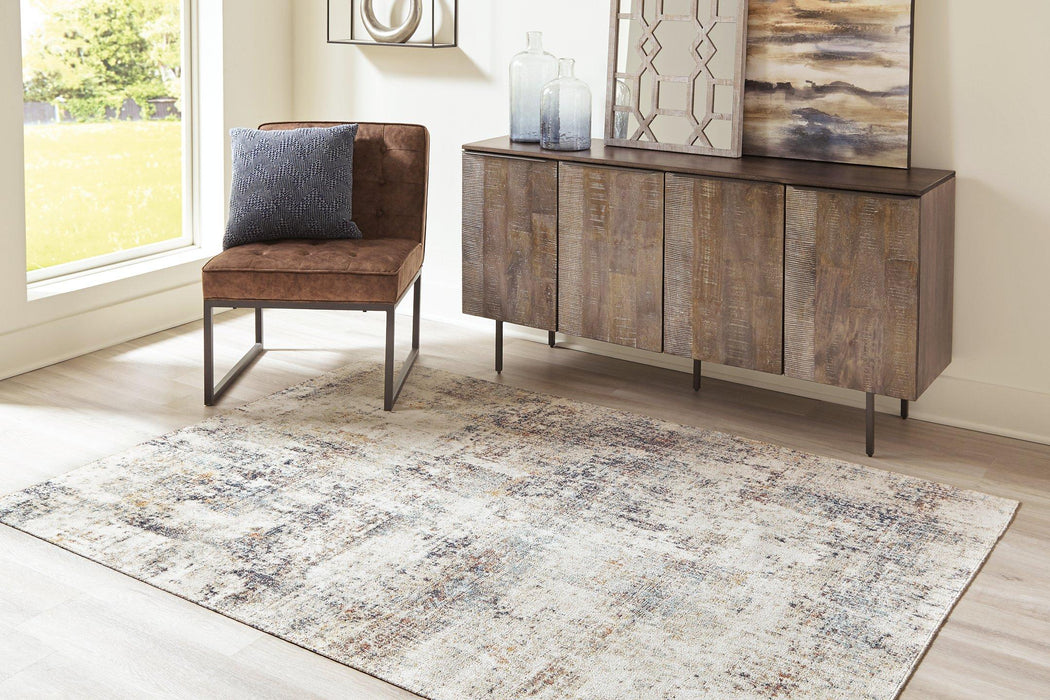 Jerelyn 7'10" x 10' Rug - De Avenue Furniture