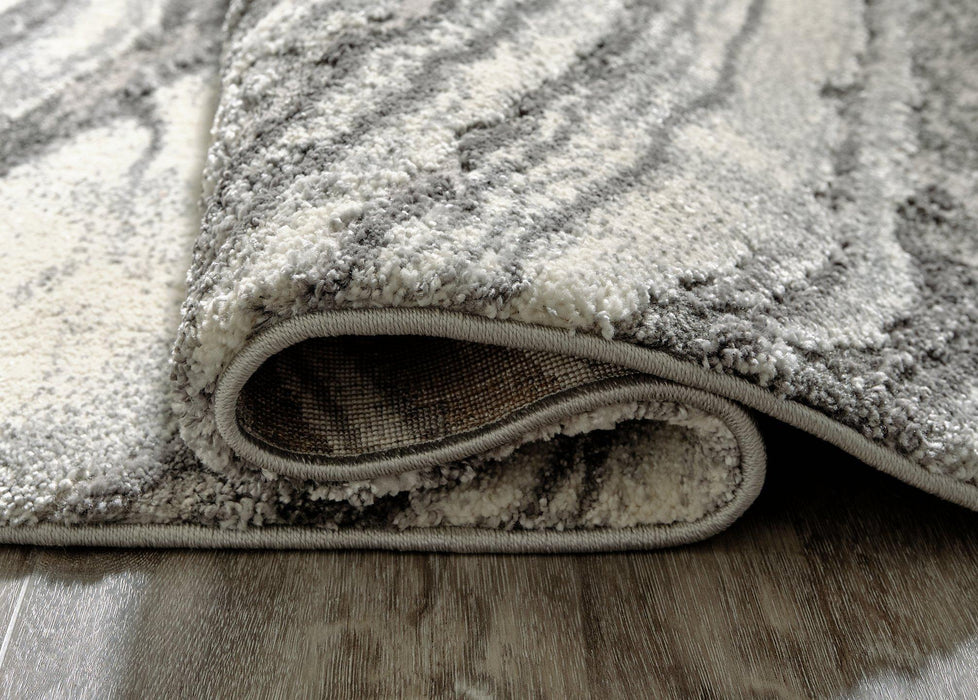 Wysdale 7'10" x 10'3" Rug - De Avenue Furniture