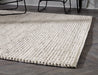 Jossick 7'8" x 10' Rug - De Avenue Furniture