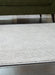 Eduring Medium Rug - De Avenue Furniture
