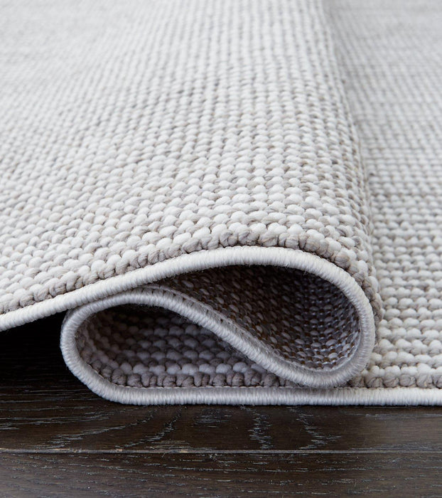 Eduring Medium Rug - De Avenue Furniture