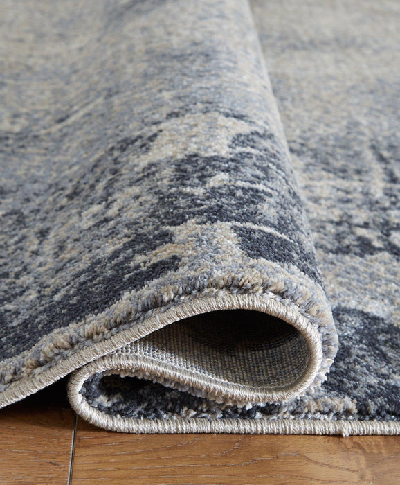 Langrich 7'10" x 10'6" Rug - De Avenue Furniture