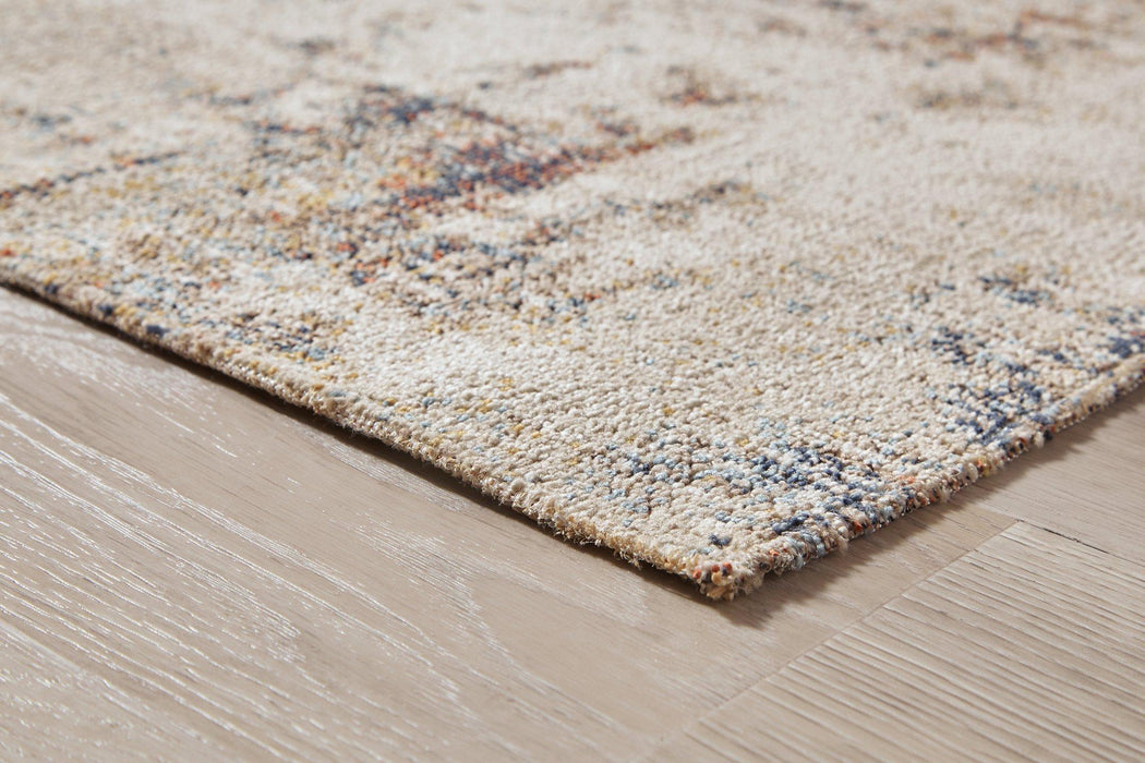 Jerelyn 7'10" x 10' Rug - De Avenue Furniture